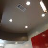 Recess lighting on ceiling.