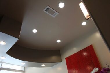 Recess lighting on ceiling.